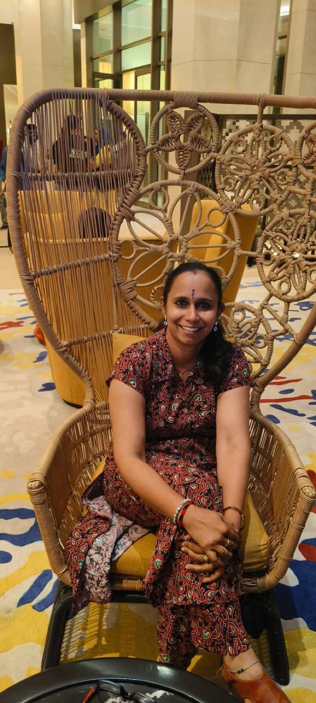 Dietitian Anitha K.P smiling in a warm setting